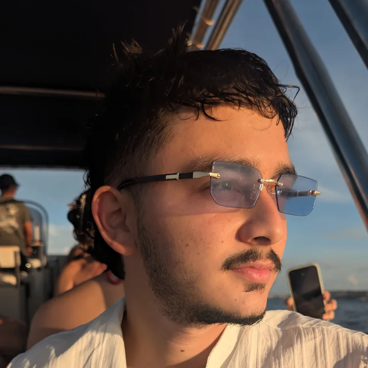 Santiago Guevara on a boat off Comino, Malta, at sunset